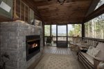 MAINFLOOR SCREENED IN PORCH LIVING AREA W/ GAS FIRPLACE & GRILL 